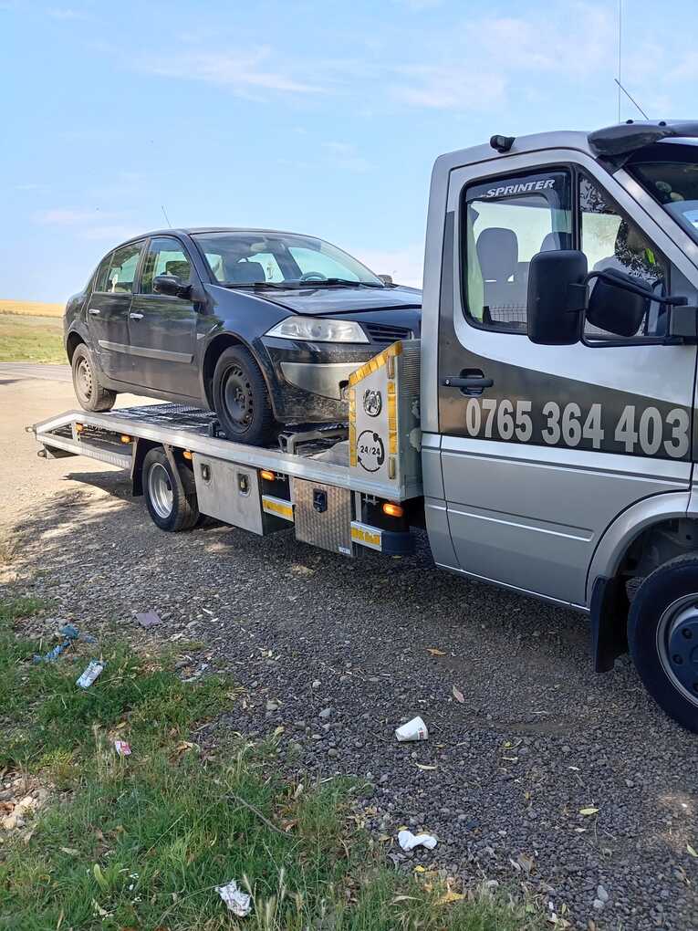 Mașină tractată cu remorcă